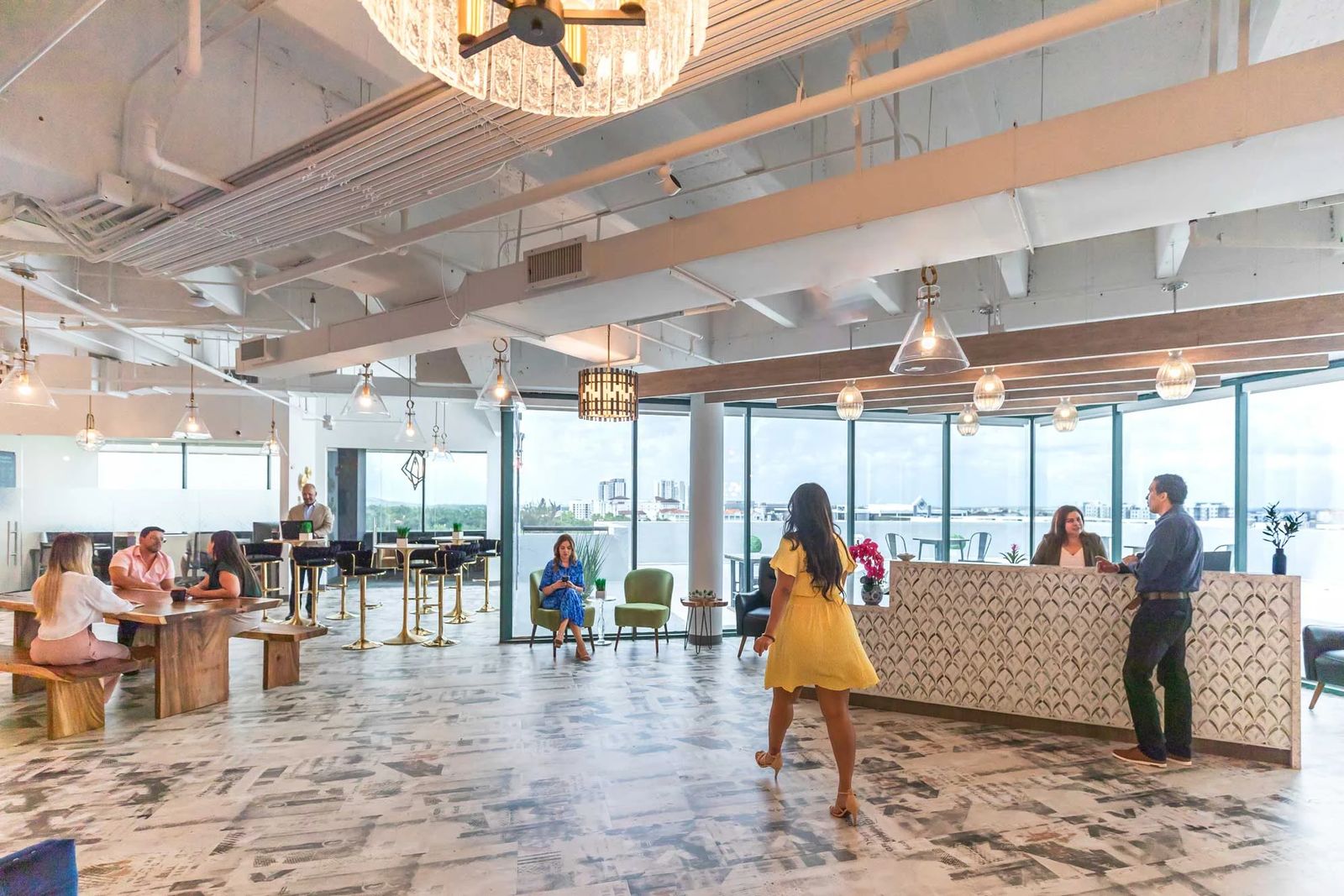 The office lobby and reception desk, with floor-to-ceiling windows